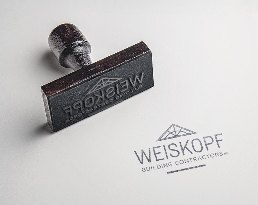 weiskopf building contractors logo design on rubber stamp