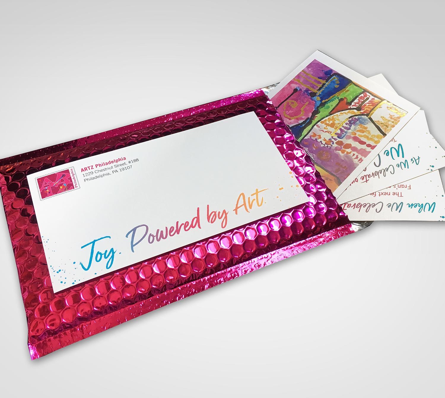 promotional materials design - shiny pink postcards and packaging created by graphic designer