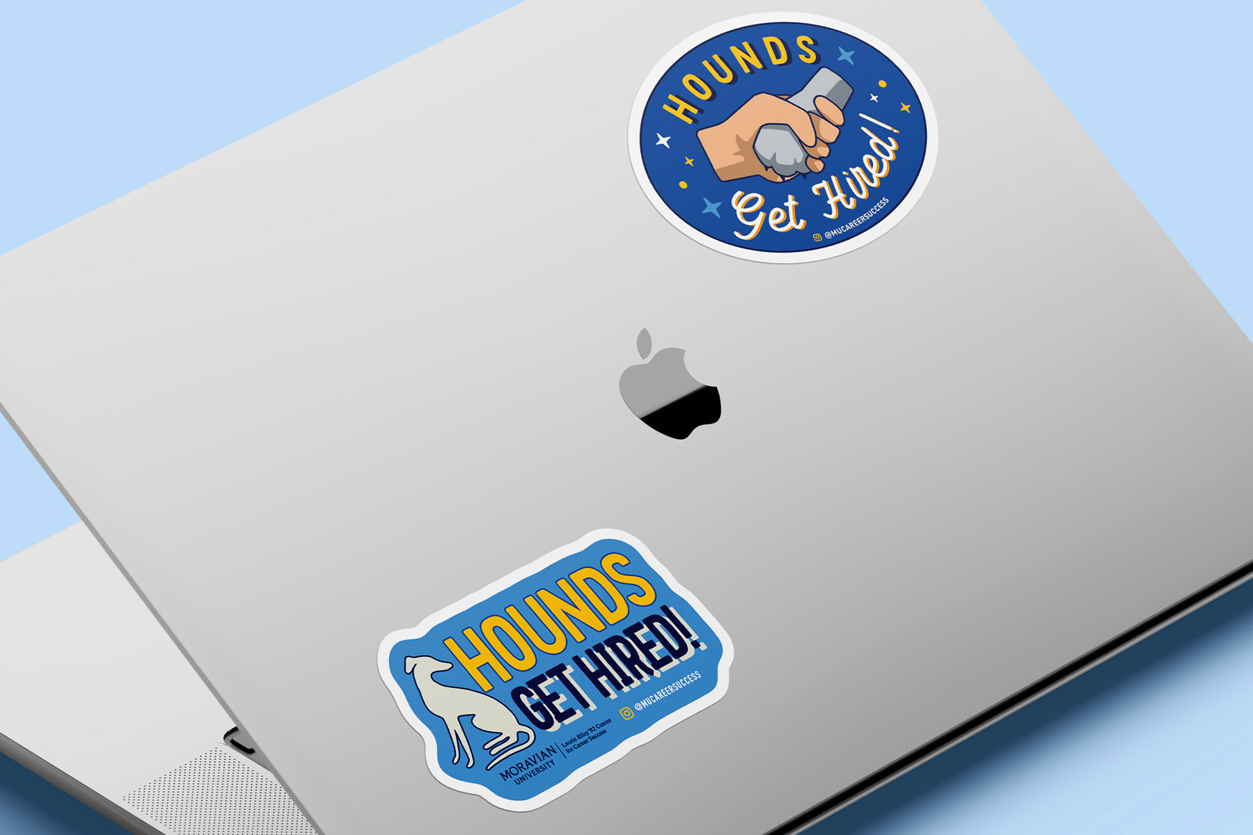 moravian stickers on laptop mockup